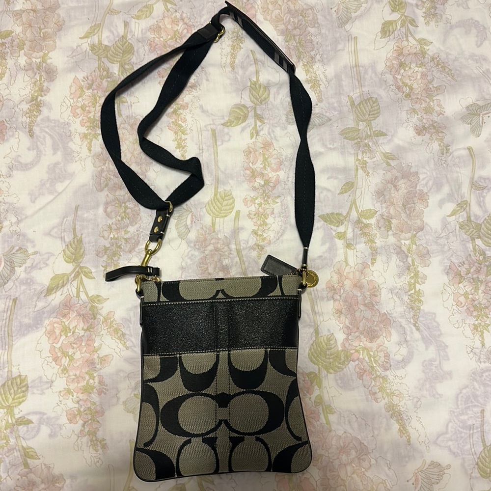 Black crossbody Coach bag never worn
